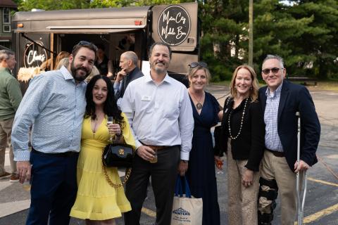 Group of 6 Home Tour guests posing for picture